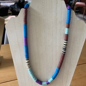 Handmade African vinyl beaded necklace.